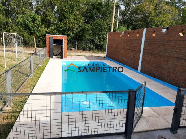 Casa con pileta y quincho